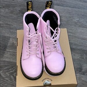 Dr. Martens Pink Combat Boots with Lace-Up Design